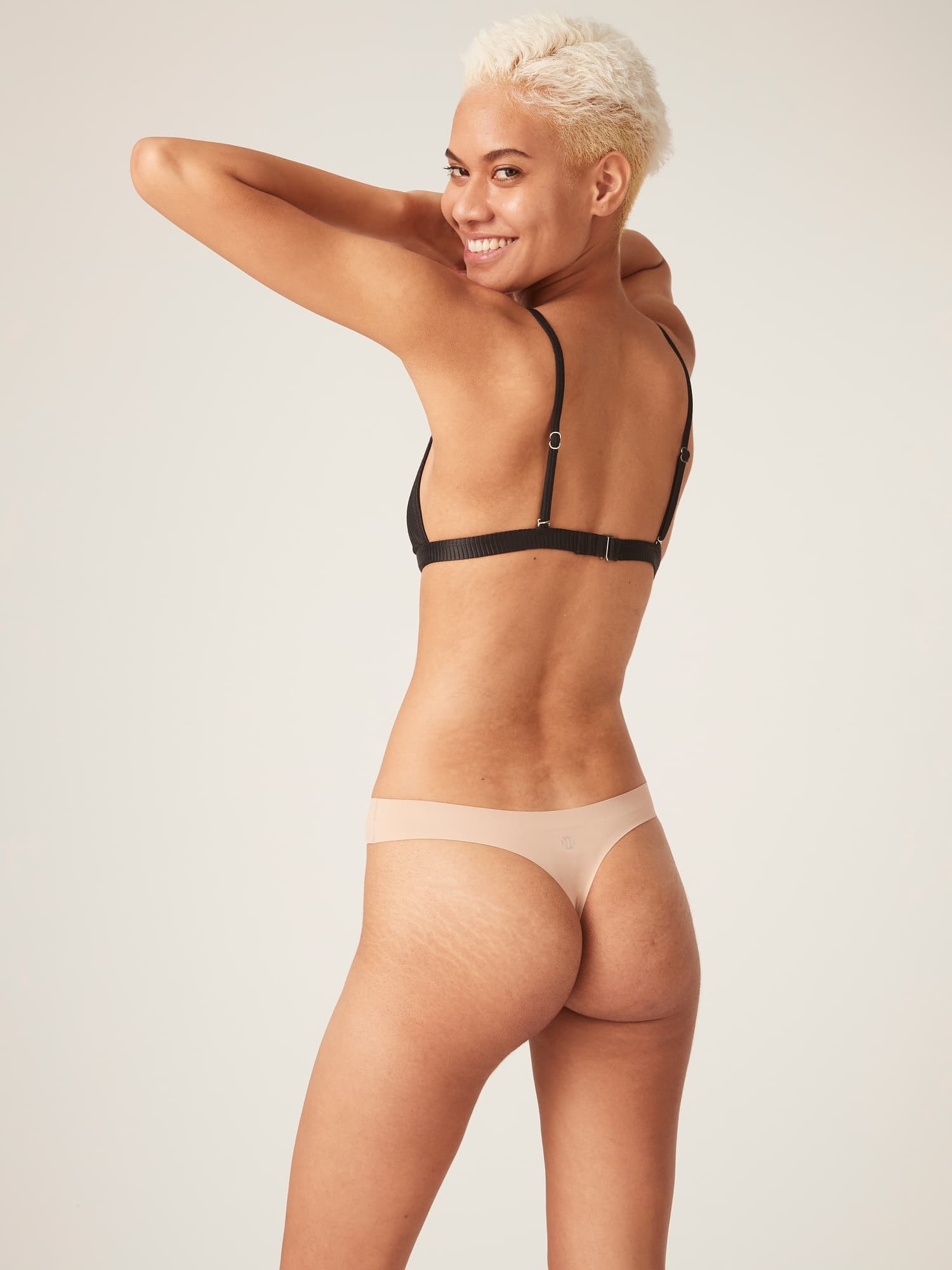 Menstruační tanga Modibodi Seamfree Thong Light Cashew (MTMSTLMC)